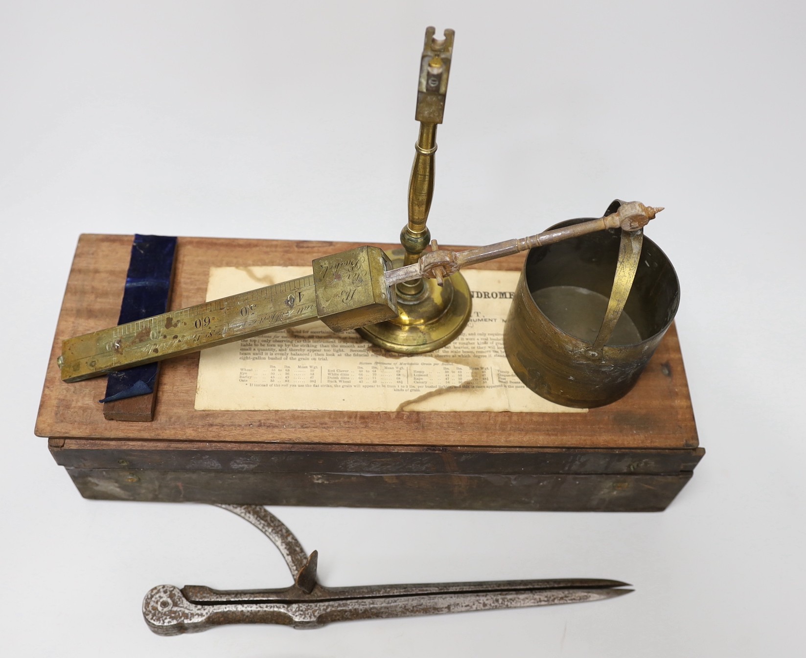 A late Georgian Marratt & Short Improved Chondrometer, a large surveyor's measure and a cast iron protractor